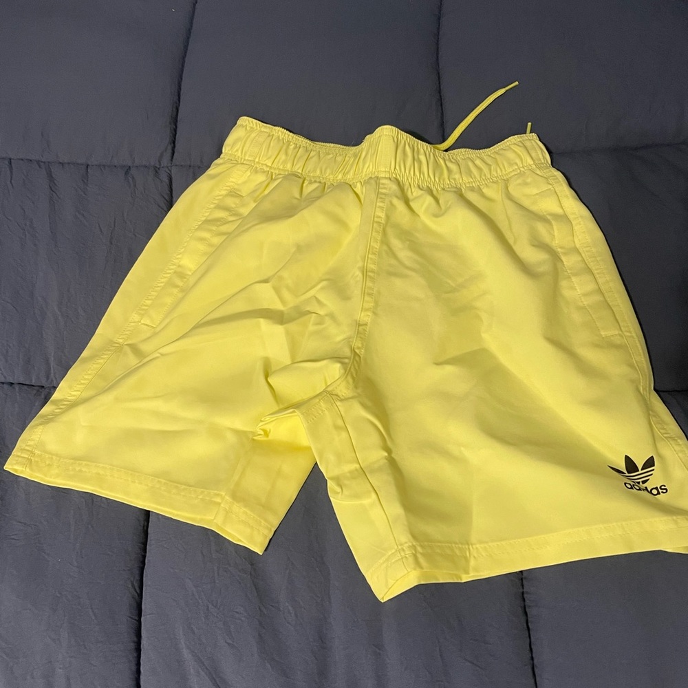 Brand new Adidas mens swim shorts. Size small